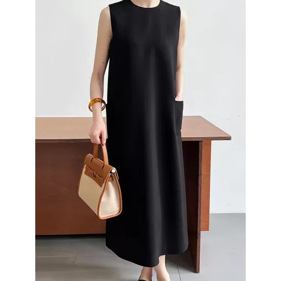 Solid Color Loose Sleeveless Round-Neck Midi Dresses Solid Color Loose Sleeveless Round-Neck Midi Dresses