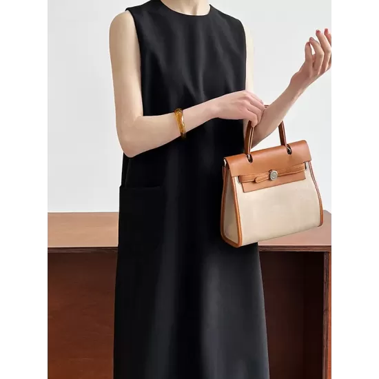 Solid Color Loose Sleeveless Round-Neck Midi Dresses Solid Color Loose Sleeveless Round-Neck Midi Dresses